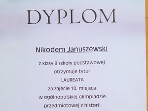 Dyplom Nikodema Januszewskiego (8d) - 10 miejsce w Ogólnopolskiej Olimpiadzie Przedmiotowej z Historii "Olimpus – sesja zimowa".